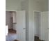 Hallway area showing wood-look flooring and access to the kitchen at 7 Whatley Se St, Atlanta, GA 30315
