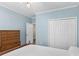 Bedroom with double closet and hardwood floors; neutral paint allows for any decor style at 740 Azalea Ave, Mcdonough, GA 30253