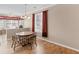 Cozy dining area featuring a wooden table and chairs, complemented by natural light at 740 Azalea Ave, Mcdonough, GA 30253
