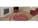 Comfortable living room showcasing a fireplace, television, and cozy seating arrangement at 740 Azalea Ave, Mcdonough, GA 30253