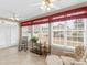 Bright sunroom with large windows and a serene atmosphere is the perfect place to relax at 740 Azalea Ave, Mcdonough, GA 30253