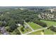 Aerial shot of homes with mature trees and landscaping in a quiet community at 5809 Warren Farm Sw Rd, Powder Springs, GA 30127