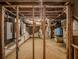 Unfinished basement with exposed duct work and utilities at 5809 Warren Farm Sw Rd, Powder Springs, GA 30127