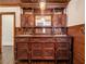 Bathroom vanity with beautiful woodwork, dual sinks, cabinets and a large mirror at 5809 Warren Farm Sw Rd, Powder Springs, GA 30127