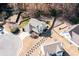 An aerial view of a home in a cul-de-sac with a lush backyard and manicured landscaping at 3952 Rhyne Way, Smyrna, GA 30082