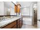 This bathroom boasts double sinks, granite countertops, a shower, and a soaking tub at 3952 Rhyne Way, Smyrna, GA 30082