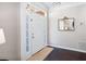 Bright entryway with hardwood floors and a sidelight window at 3952 Rhyne Way, Smyrna, GA 30082