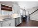 This well-lit kitchen features a breakfast nook with stainless steel appliances and granite countertops at 3952 Rhyne Way, Smyrna, GA 30082