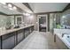 Elegant bathroom with double vanity, granite countertops, walk-in shower, and soaking tub at 5825 Trailwood Ct, Suwanee, GA 30024