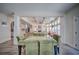 Inviting dining area showing the open floorplan with views of the living room and stylish architectural details at 5825 Trailwood Ct, Suwanee, GA 30024
