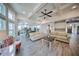 The open concept great room provides tons of natural light, hardwood floors, and an open floor plan at 5825 Trailwood Ct, Suwanee, GA 30024