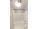 Clean and well-maintained bathroom featuring a soaking tub and shower with white subway tile at 5989 Zane Ct, Douglasville, GA 30135