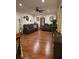 Spacious living room with hardwood floors, ceiling fan, and comfortable seating area at 2151 Overland Way, Powder Springs, GA 30127
