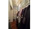 Well-organized walk-in closet with ample hanging space and shelving for optimal storage solutions at 2151 Overland Way, Powder Springs, GA 30127
