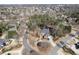 Aerial view of a beautiful neighborhood featuring mature trees, landscaping, and an attractive home at 2821 Grey Moss Pass, Duluth, GA 30097