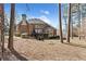 Expansive backyard featuring mature trees and a well-maintained lawn at 2821 Grey Moss Pass, Duluth, GA 30097