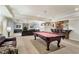 Finished basement featuring a pool table, seating, wet bar, recessed lighting, and ample space at 2821 Grey Moss Pass, Duluth, GA 30097