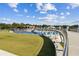 Picturesque aerial view showcases a vibrant community gathering spot with lush green spaces and tranquil water features at 2882 Manor Glen Ln, Suwanee, GA 30024