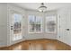 Bright breakfast nook with large windows and access to the backyard at 2882 Manor Glen Ln, Suwanee, GA 30024