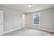 Spacious bedroom with a large window and neutral tones at 3143 Stonegate Sw Dr, Atlanta, GA 30331