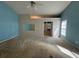 Bedroom featuring a large window and access to the bathroom at 50 Cold Springs Ct, Covington, GA 30016