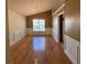 Bright dining room with hardwood floors, wainscoting, and a stylish chandelier at 50 Cold Springs Ct, Covington, GA 30016