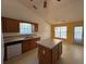 Functional kitchen featuring an island, ample counter space, and a breakfast nook at 50 Cold Springs Ct, Covington, GA 30016