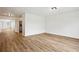 Bright living room featuring modern flooring that complements the neutral wall paint at 5151 Martins Crossing Rd, Stone Mountain, GA 30088