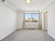 Bedroom featuring neutral carpet and city views from the window at 2479 Peachtree Ne Rd # 1703, Atlanta, GA 30305