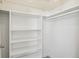 A well-organized walk-in closet with ample shelving and hanging space, maximizing storage potential at 2479 Peachtree Ne Rd # 1703, Atlanta, GA 30305