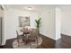 Cozy dining area features a round table, chairs, and an art-adorned wall at 2479 Peachtree Ne Rd # 1703, Atlanta, GA 30305