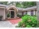 Charming front entrance with brick walkway, well-maintained landscaping, and welcoming front door at 366 Blackland Nw Rd, Atlanta, GA 30342