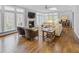 Bright living room with fireplace, lots of windows and hardwood floors at 366 Blackland Nw Rd, Atlanta, GA 30342