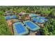 Overview of neighborhood tennis courts, swimming pools, and clubhouse at 10275 Worthington Mnr, Suwanee, GA 30024