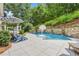 Swimming pool with waterfall feature at 10275 Worthington Mnr, Suwanee, GA 30024