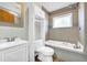 Bathroom offering a tub and shower combination at 1315 Woodland Sw Dr, Oxford, GA 30054