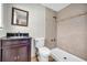 This bathroom offers a toilet and shower at 1315 Woodland Sw Dr, Oxford, GA 30054