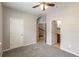 Neutral bedroom with carpet, ceiling fan, and closet at 2251 Limehurst Ne Dr, Atlanta, GA 30319