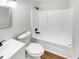 Bathroom featuring a shower-tub combo, and modern vanity and fixtures at 4254 Timber Trace Rd, Loganville, GA 30052