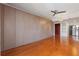 Bedroom featuring hardwood floors, ceiling fan, and large closet along the wall at 199 14Th Ne St # 1704, Atlanta, GA 30309