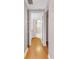 Hallway leading to updated bathroom with modern fixtures and neutral tones at 199 14Th Ne St # 1704, Atlanta, GA 30309