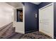Hallway with modern decor leading to apartment 1704 with plush carpet and wood trim at 199 14Th Ne St # 1704, Atlanta, GA 30309