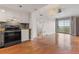 Charming kitchen seamlessly connected to the open-concept living area and balcony at 199 14Th Ne St # 1704, Atlanta, GA 30309