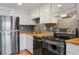 Updated kitchen featuring stainless steel appliances and butcher block countertops at 199 14Th Ne St # 1704, Atlanta, GA 30309