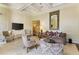 Spacious living room with coffered ceiling and neutral color scheme at 199 14Th Ne St # 1704, Atlanta, GA 30309