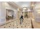 Elegant lobby with marble floors, decorative moldings, and stylish furnishings at 199 14Th Ne St # 1704, Atlanta, GA 30309