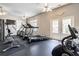 The fitness center features modern equipment, fans, and plenty of natural light at 2017 Grove Field Ln, Marietta, GA 30064