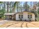 Charming single-story home with a carport and well-maintained landscaping at 2542 Warwick Ne Cir, Atlanta, GA 30345