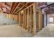 Unfinished basement showcasing the framing and foundation of the home at 3119 Stonegate Sw Dr, Atlanta, GA 30331