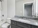 Modern bathroom with granite countertop and modern fixtures at 3119 Stonegate Sw Dr, Atlanta, GA 30331